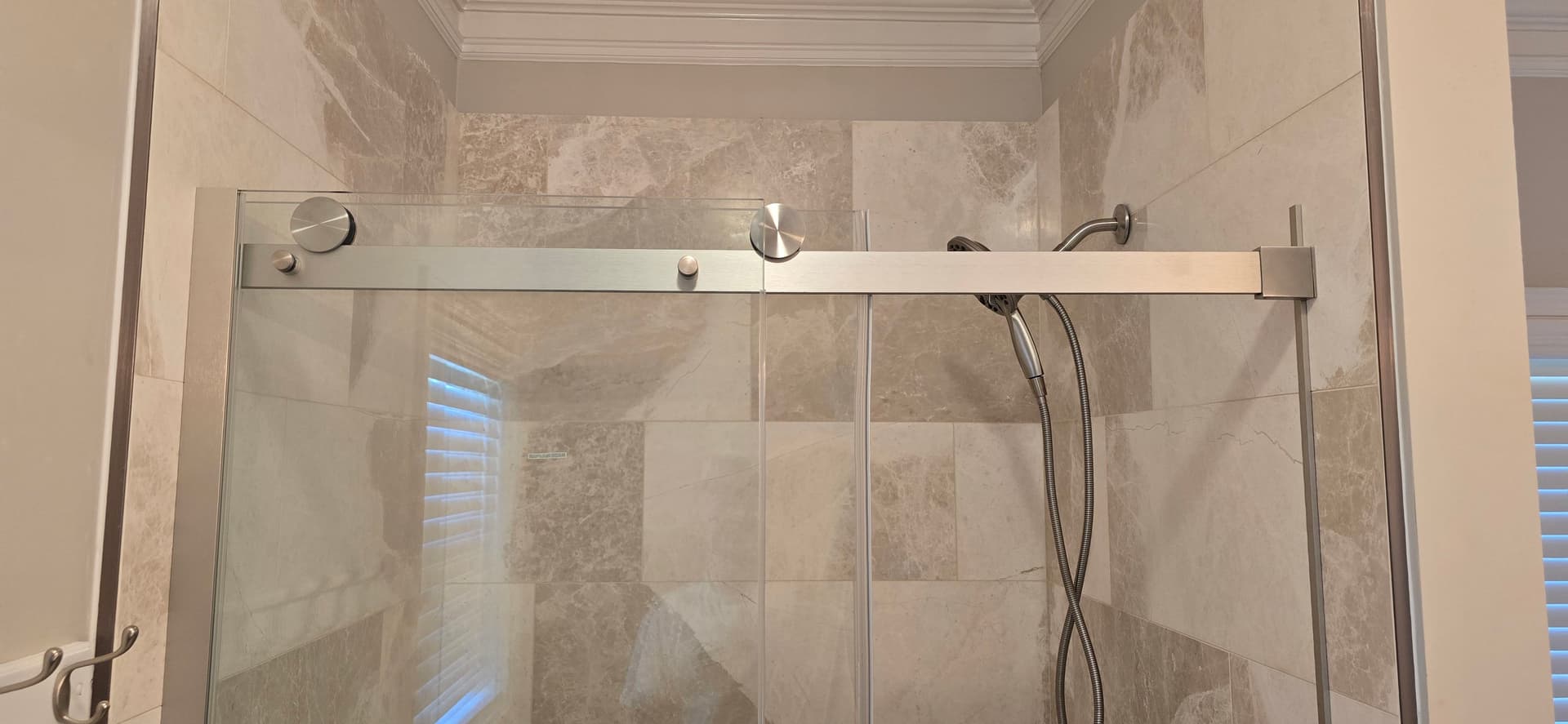 Gallery photos for Marble-Style Bathroom Renovation with Frameless Glass Shower: Image #2