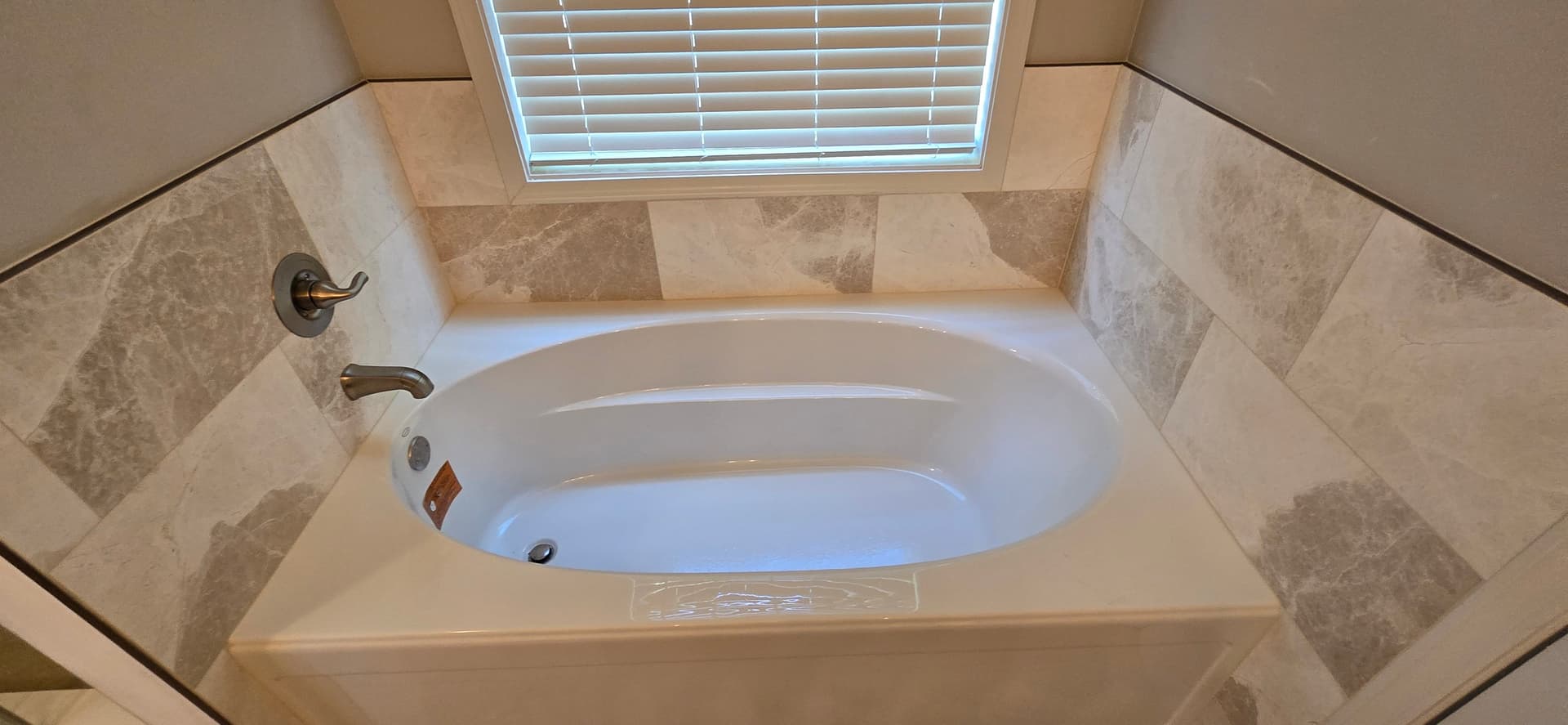 Gallery photos for Marble-Style Bathroom Renovation with Frameless Glass Shower: Image #1